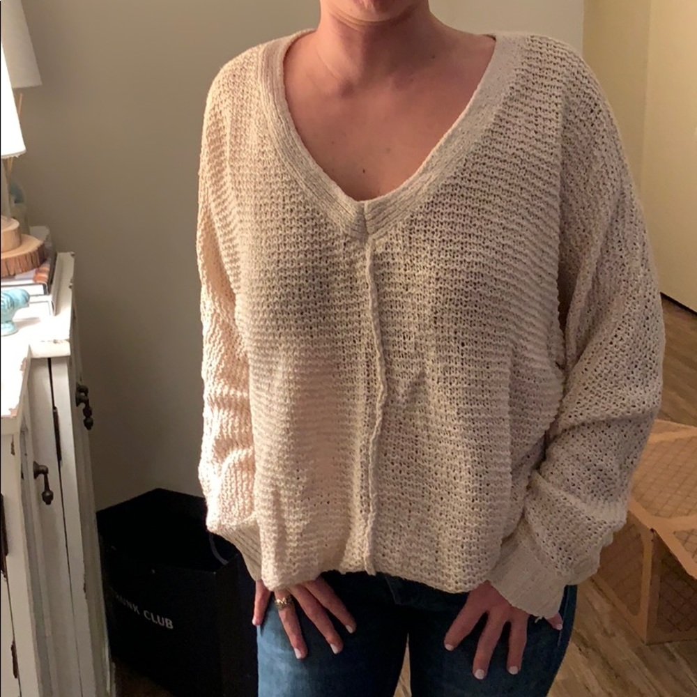 Free People  cream sweater.